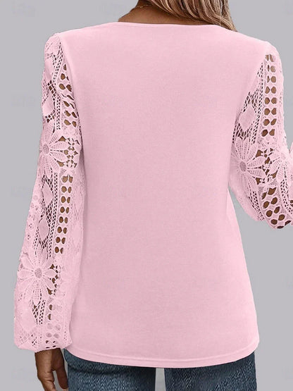 Blusa elegante para mujer con bordado calado y encaje asimétrico, manga larga, ajuste regular. Ideal para uso diario, verano y vacaciones. Disponible en negro, blanco y rosa.